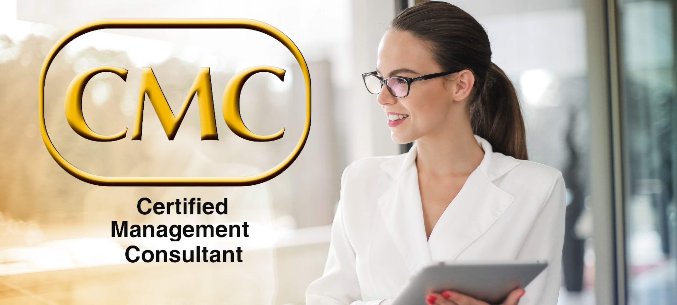 Female consultant smiles with CMC logo
